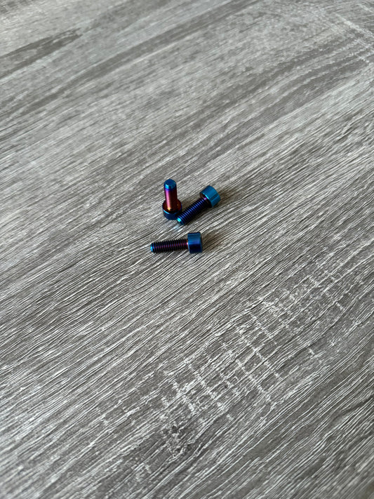 Titanium upper and lower triple clamp bolts